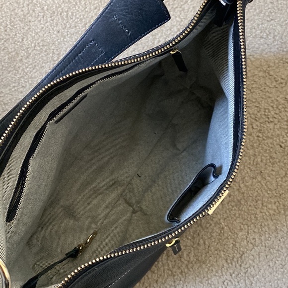 Dooney and bourke shoulder bag with white stitching. - Picture 3 of 4